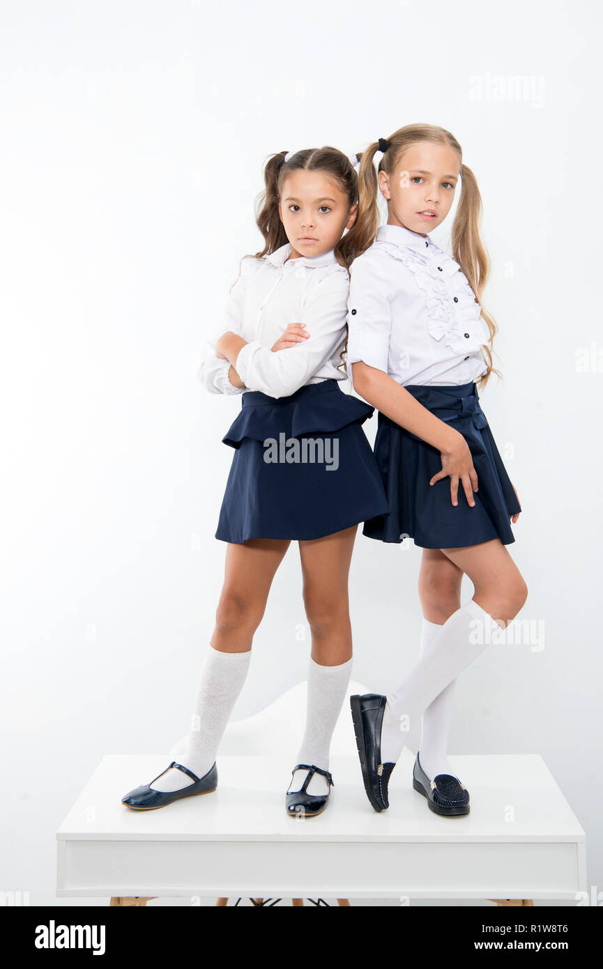 school fashion. kid fashion for little girls in school uniform. little  girls isolated on white Stock Photo - Alamy