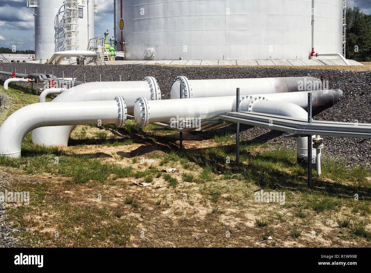 Steel fuel pipes and valves at the oil refinery Stock Photo Alamy