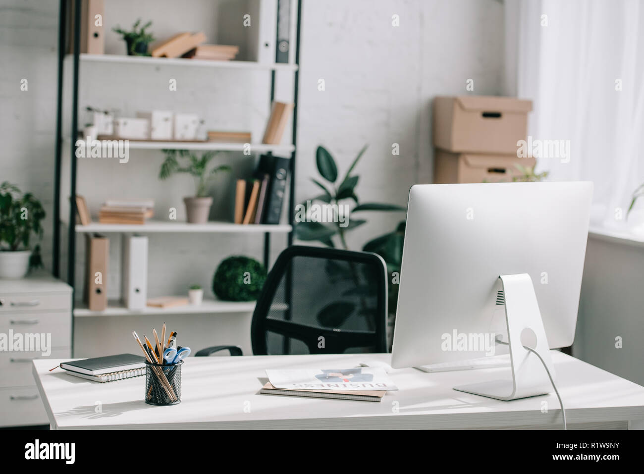 computer, table and chair in business modern office Stock Photo - Alamy
