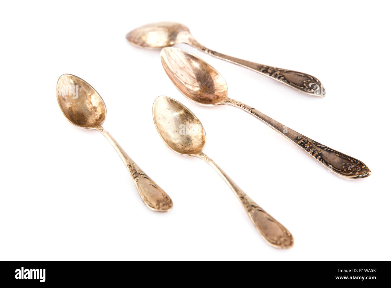 Vintage spoons isolated on white background Stock Photo - Alamy