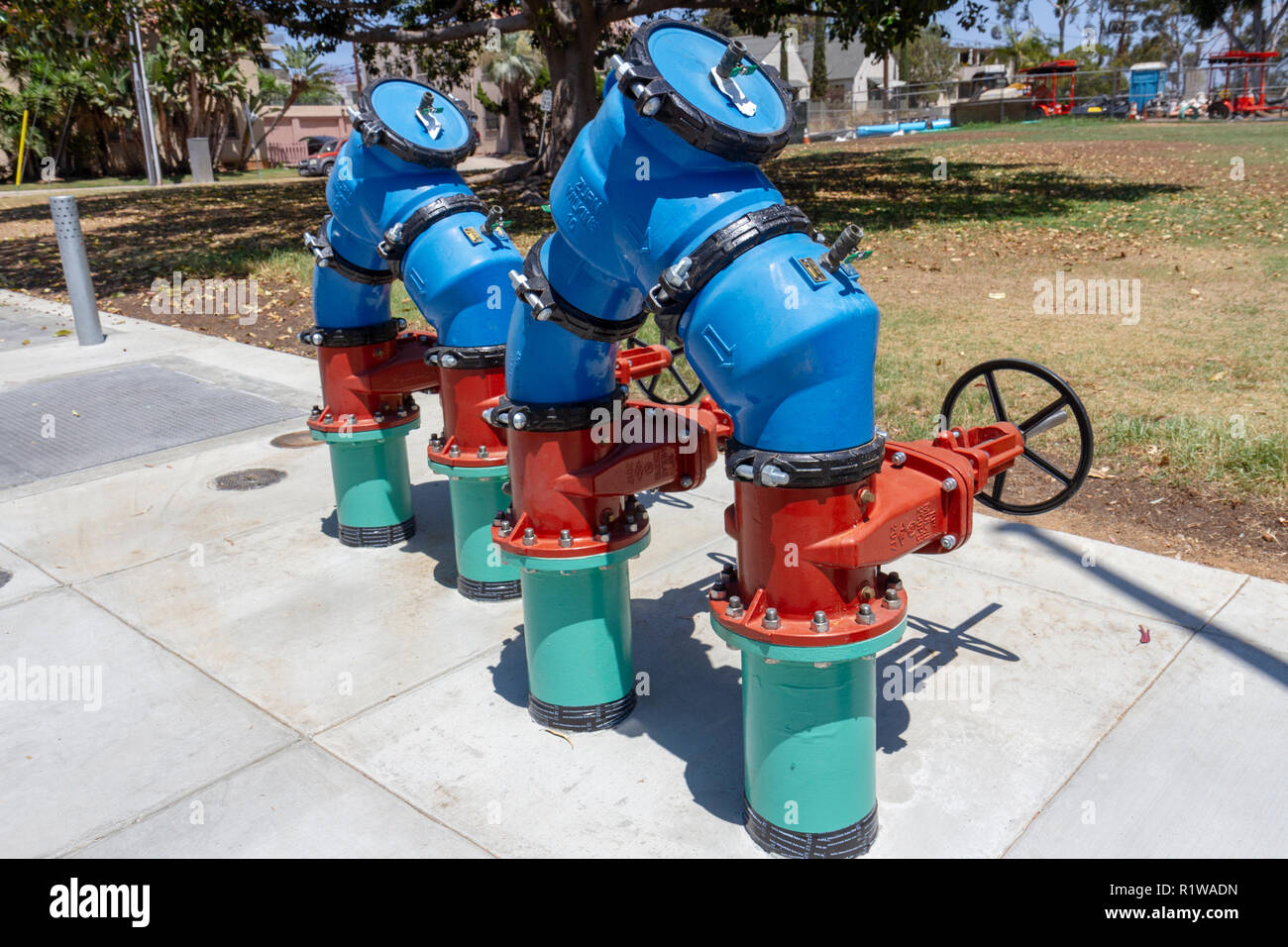 Surface water control pipework including double check backflow preventers, Balboa Park, San Diego, California, United States. Stock Photo