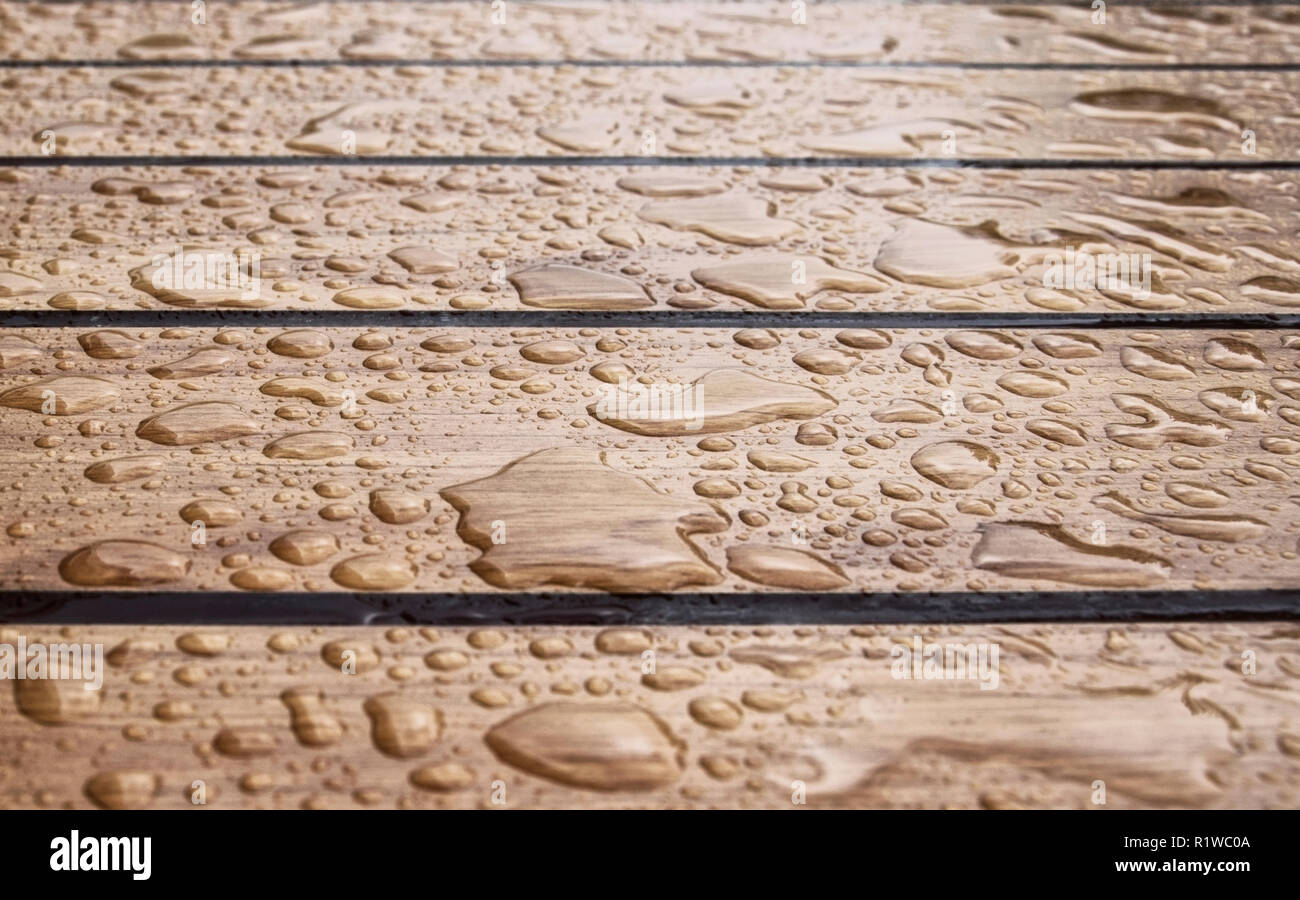 The thaw on a wooden table after a rain is a lot of Stock Photo Alamy