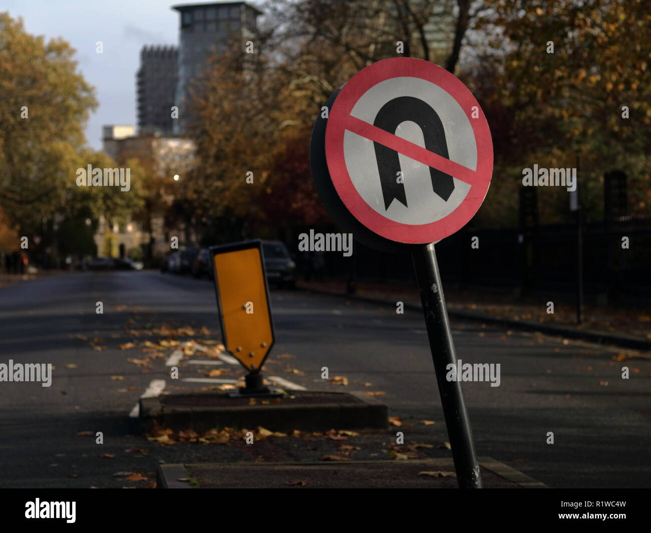 Reverse sign in London street near Regents park in Autumn. No U-turns sign. Stock Photo