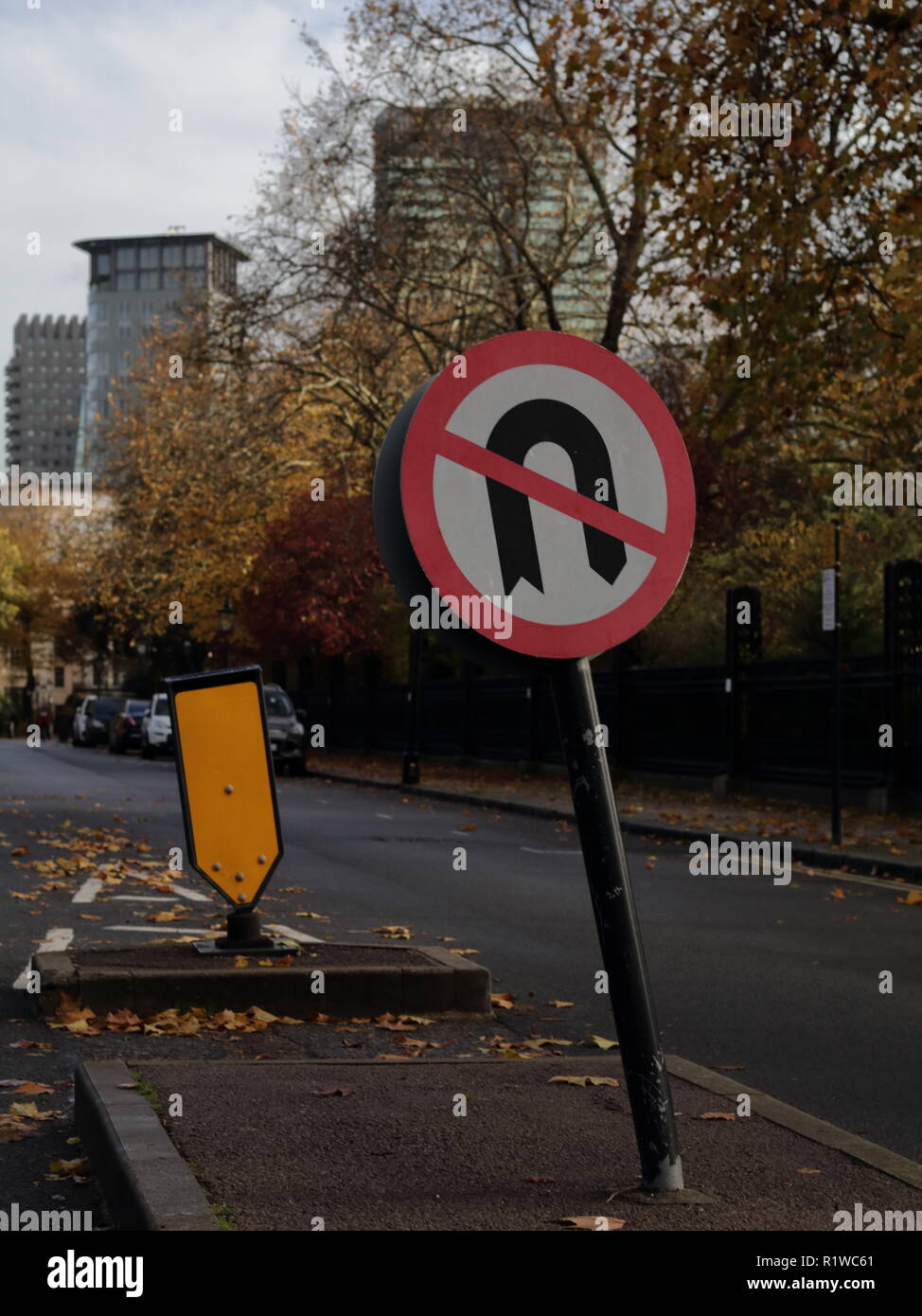 Reverse sign in London street near Regents park in Autumn. No U-turns sign. Stock Photo