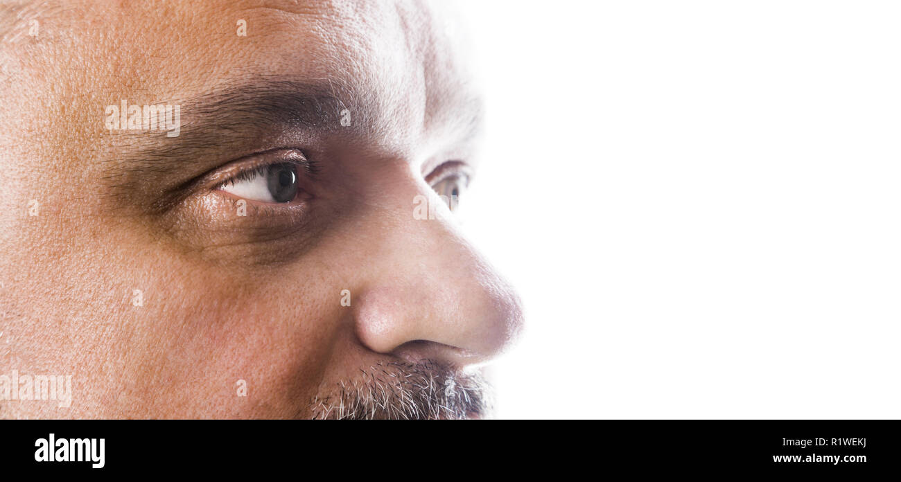 The eyes of man portrait in profile. Isolated on a white background Stock Photo