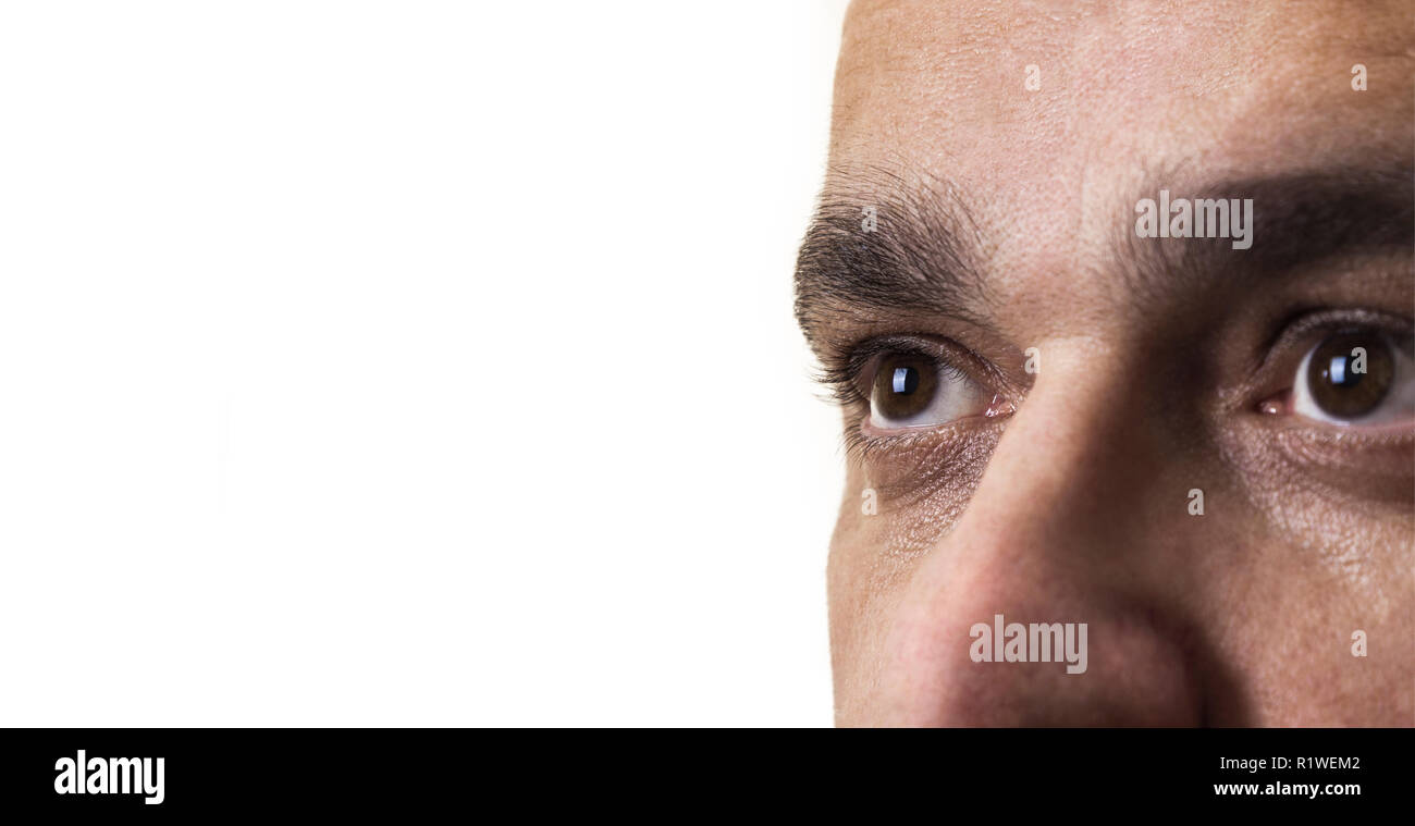 The eyes of man portrait in profile. Isolated on a white background Stock Photo