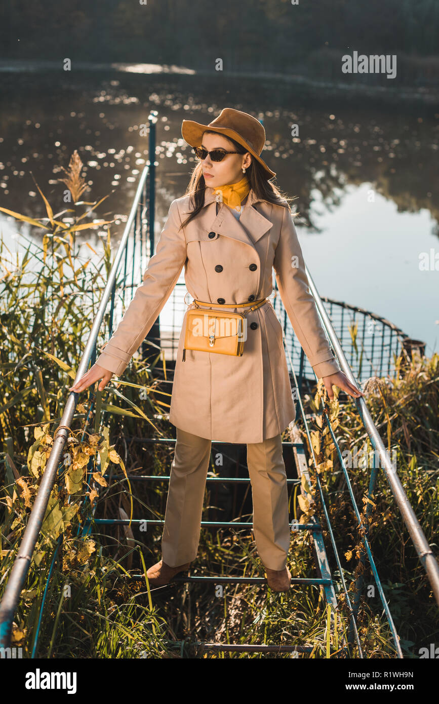 trench coat and hat