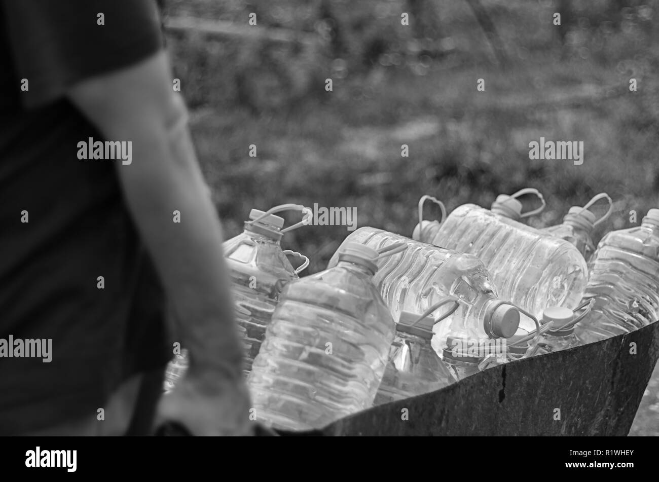 Climate change and water supply shortage threats. White male pulls a