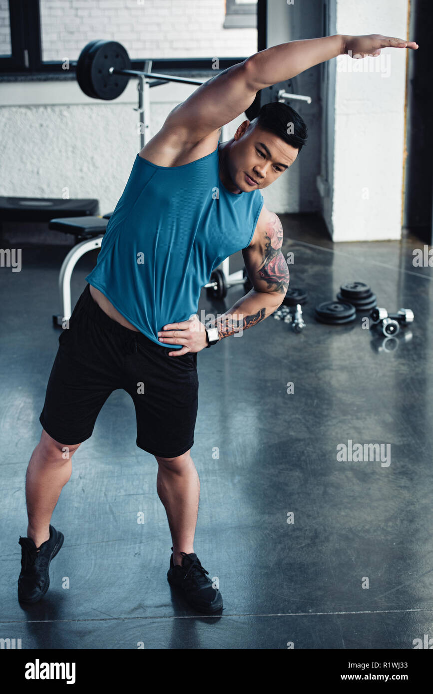 Stretching exercise gym man hi-res stock photography and images - Alamy