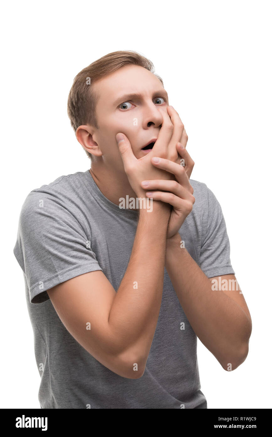 Scared man gesticulating emotionally portrait Stock Photo - Alamy