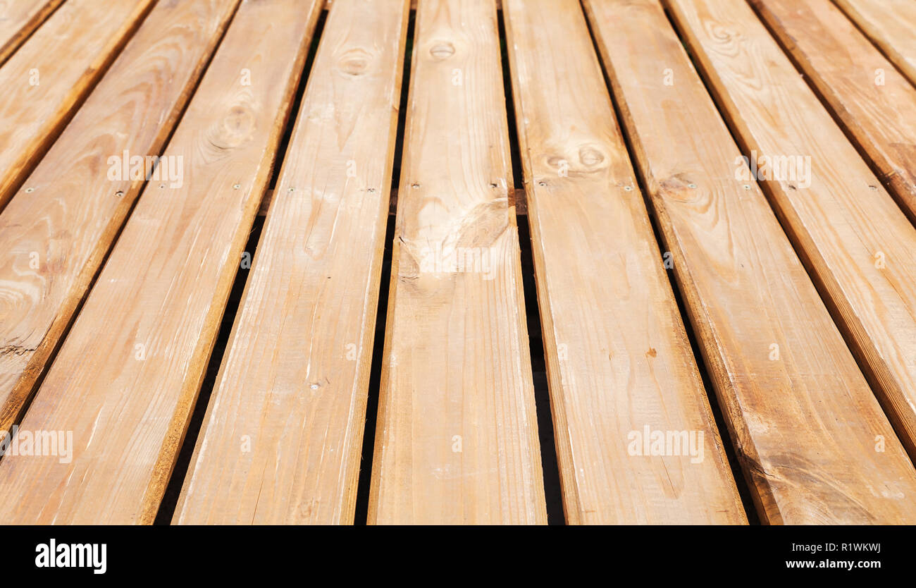 Natural new wooden floor. Background photo with perspective effect and selective focus Stock Photo