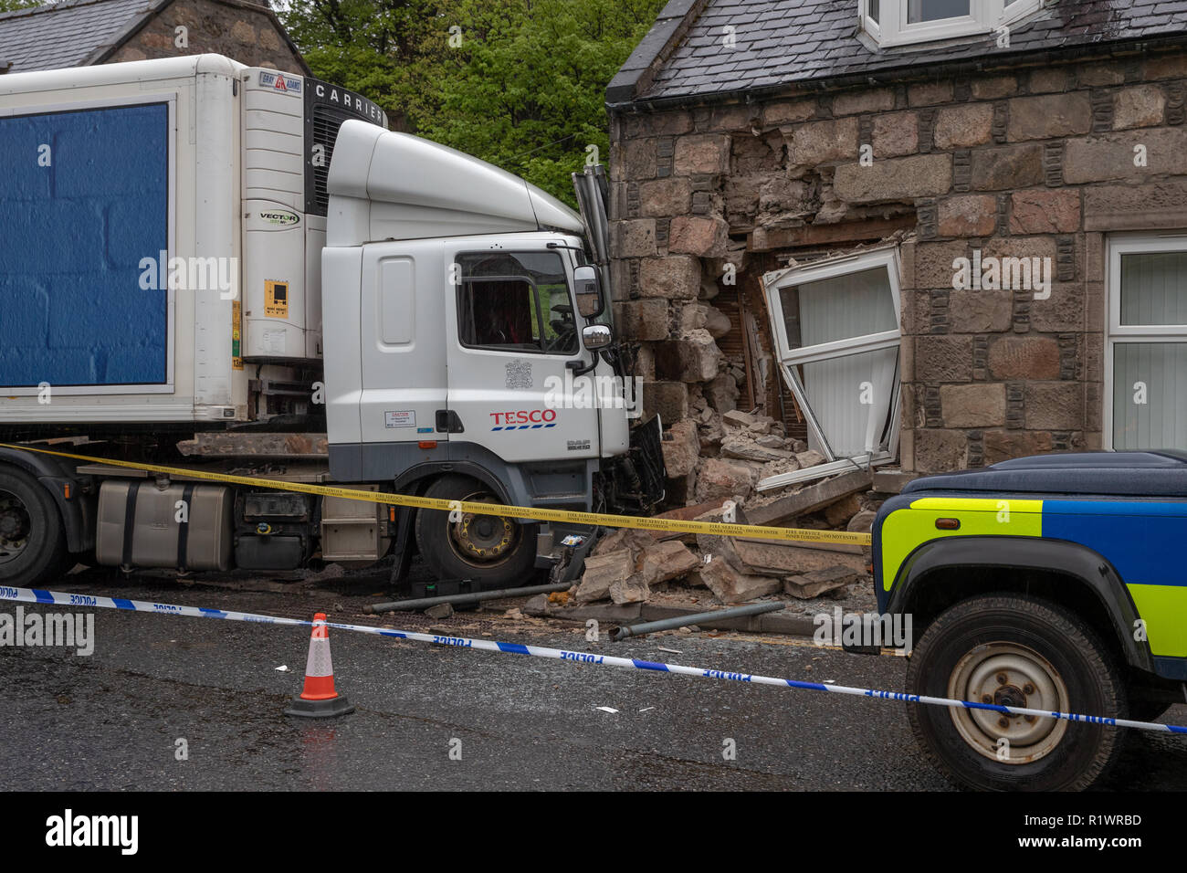 ROTHES, MORAY, SCOTLAND 13 MAY 2018:- This is the scene of the accident where a Tesco Delivery truck collided into a house on the main street. Stock Photo