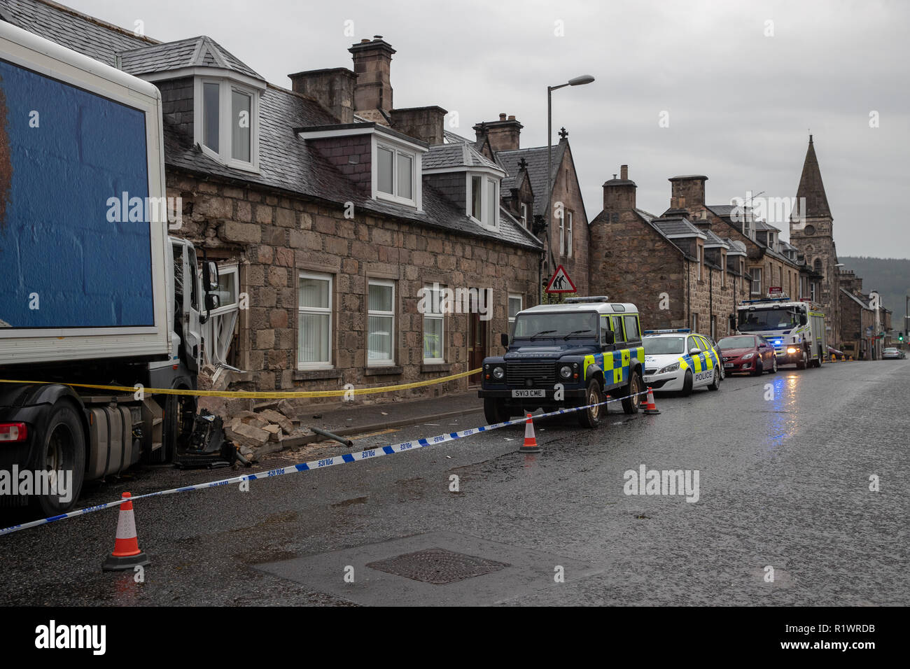ROTHES, MORAY, SCOTLAND 13 MAY 2018:- This is the scene of the accident where a Tesco Delivery truck collided into a house on the main street. Stock Photo