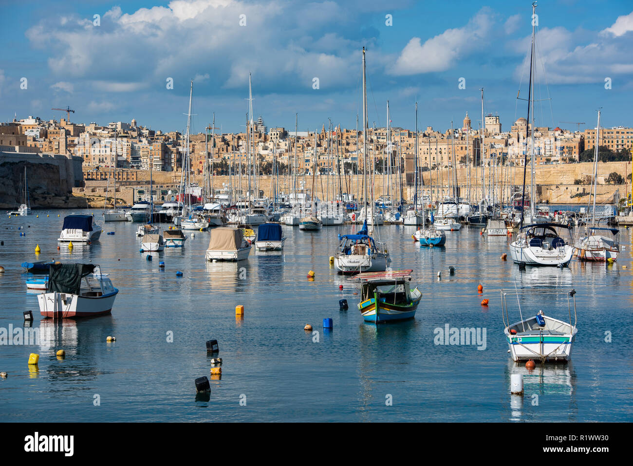 Fishing boats in Marsaxlokk harbour, Malta Stock Photo
