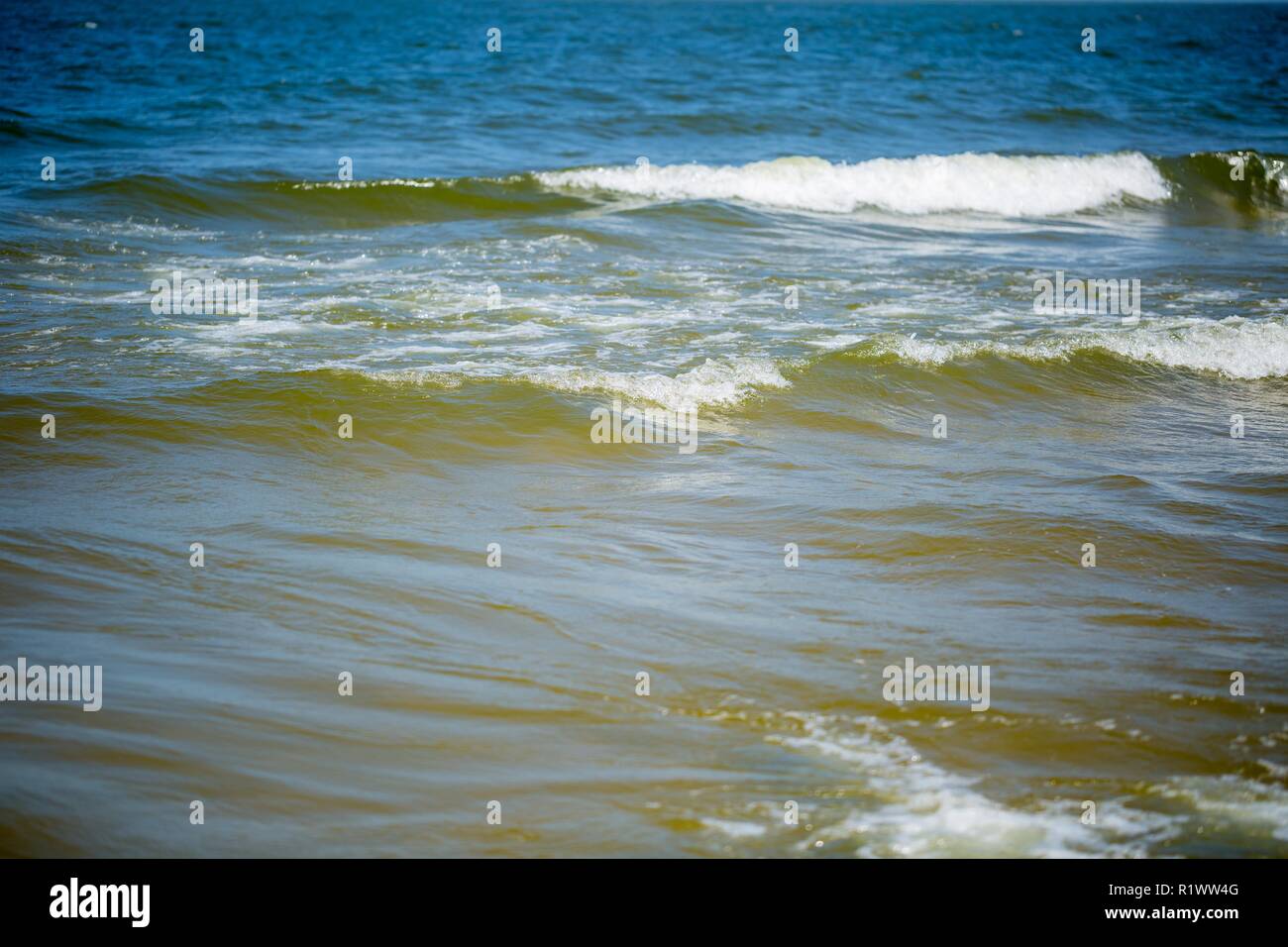 Sea Waves breaking on shore. Baltic Sea waves in close up. Stock Photo