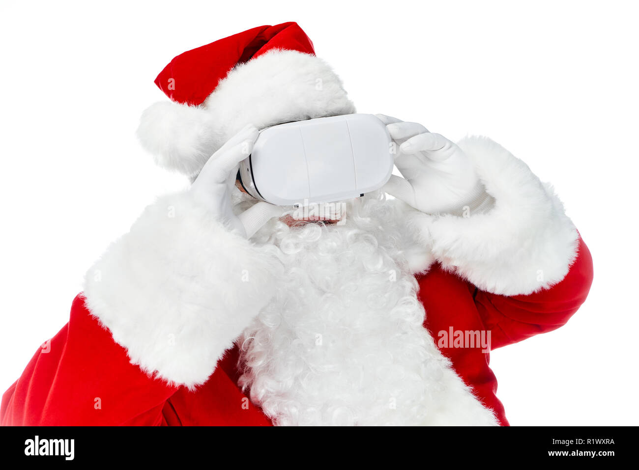 santa claus using virtual reality headset isolated on white Stock Photo
