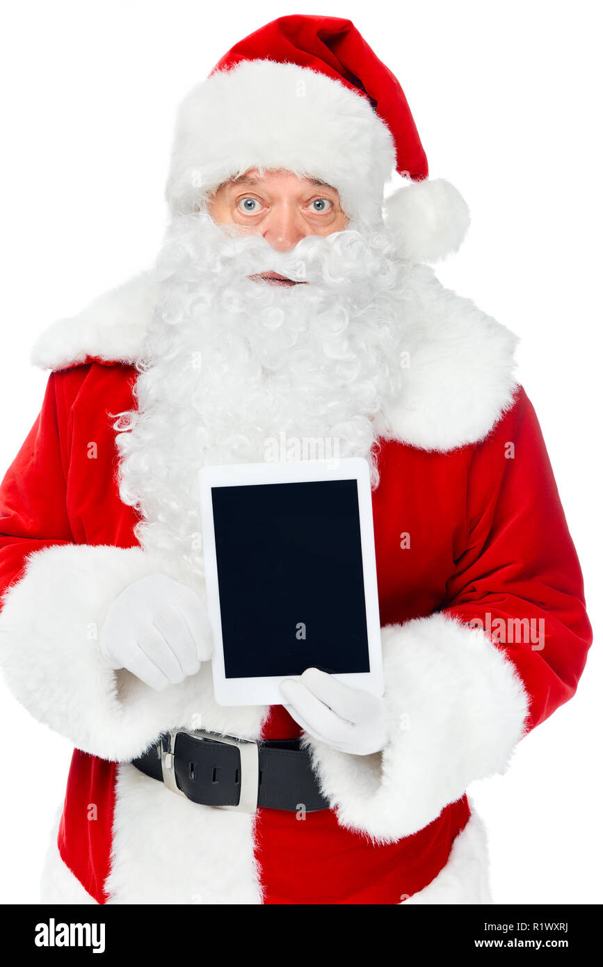 santa claus presenting digital tablet with copy space isolated on white ...