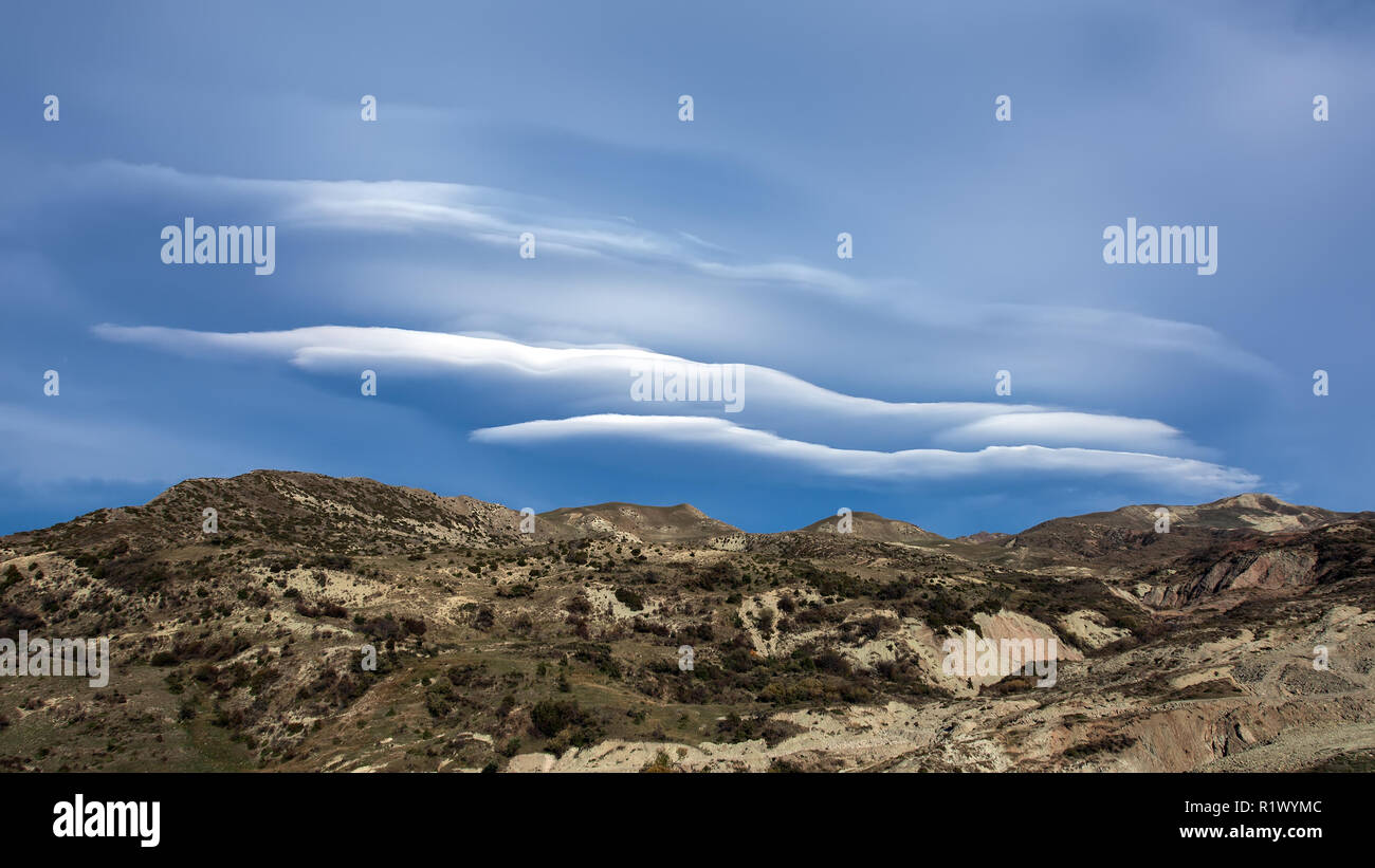 Amazing beautiful cloud over the mountain range Stock Photo - Alamy