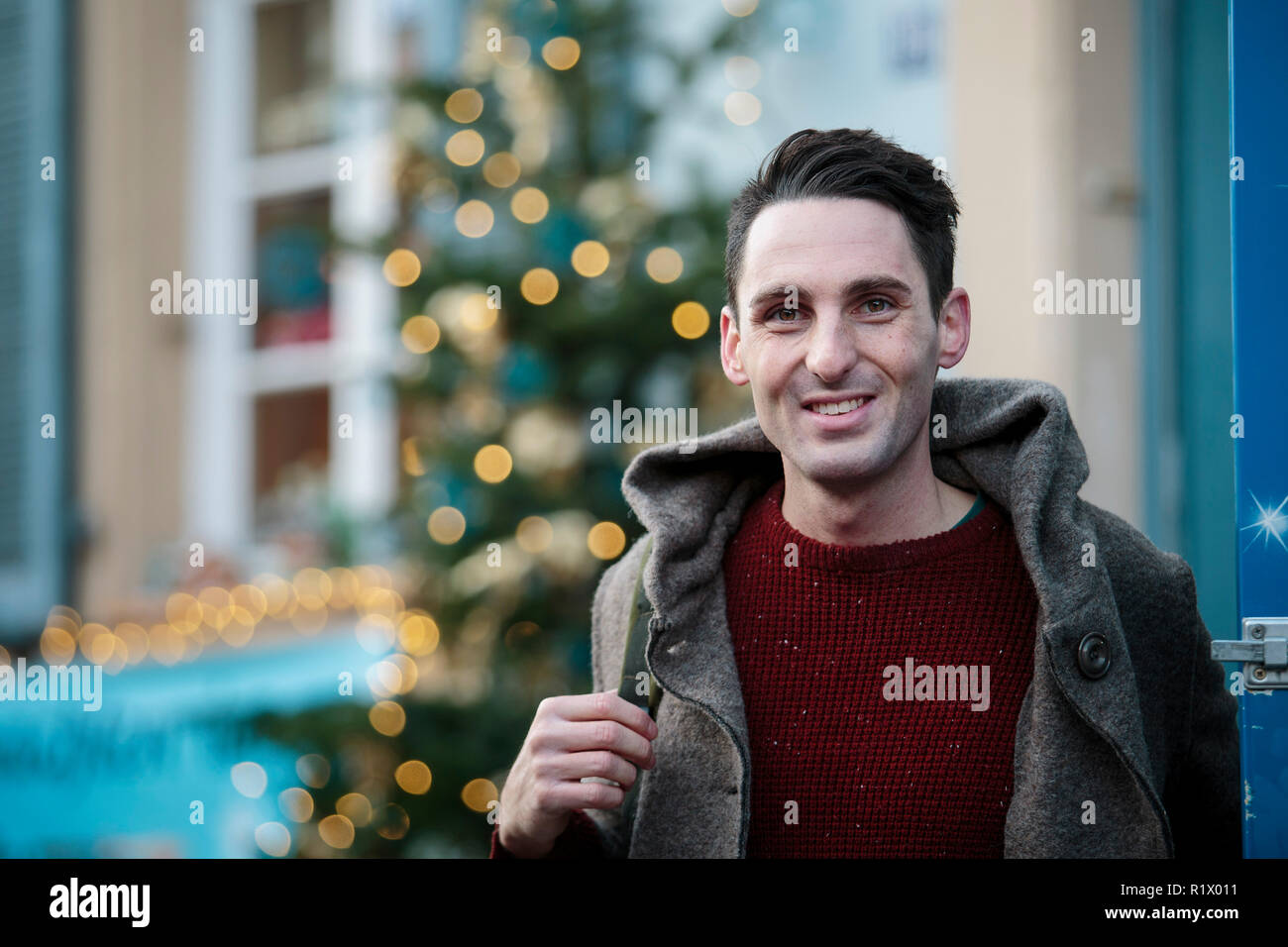 Outdoor Young man Winter Portrait walking in the city Stock Photo
