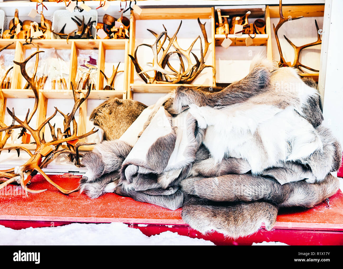 Market stall with traditional souvenirs such as reindeer skin and horns
