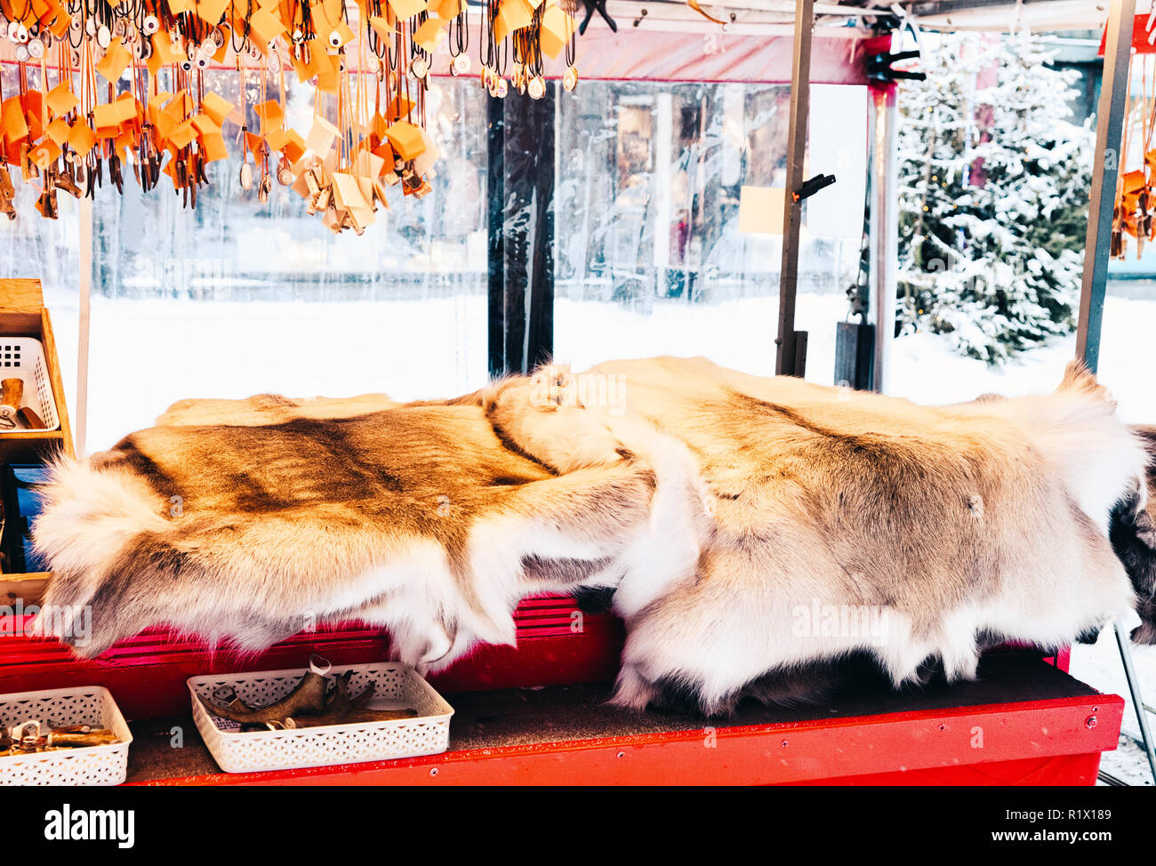 Winter Saami Souvenirs such as reindeer fur and horns in Finland in Lapland in winter. Stock Photo