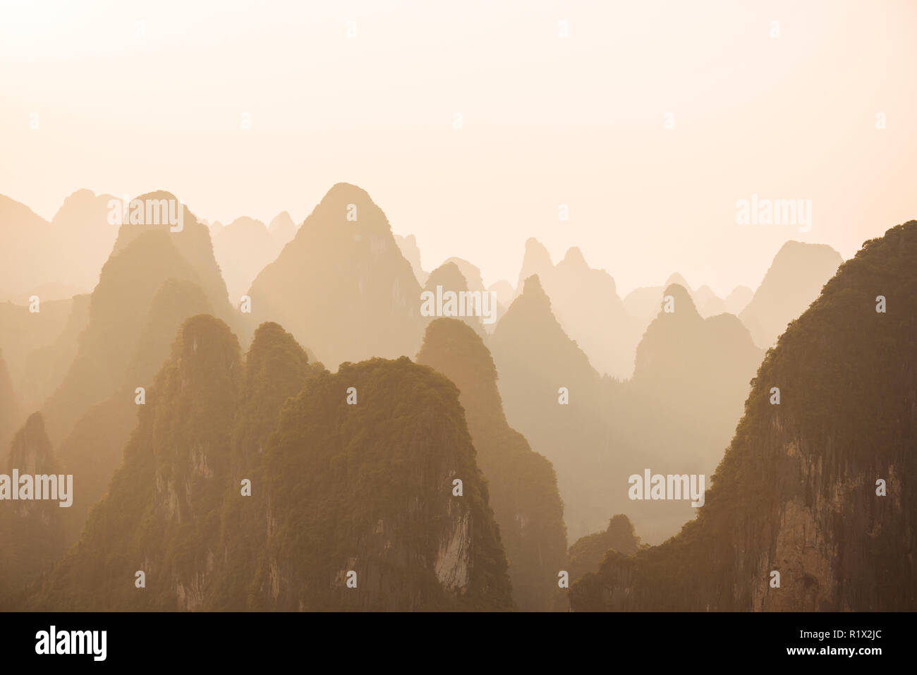 Sunset over Karst Hills from Lao Zhai, Xingping, Guilin, Guangxi Province, China Stock Photo