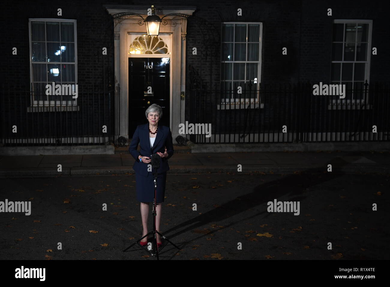 Prime Minister Theresa May makes a statement outside 10 Downing Street, London, confirming that Cabinet has agreed the draft Brexit withdrawal agreement. Stock Photo