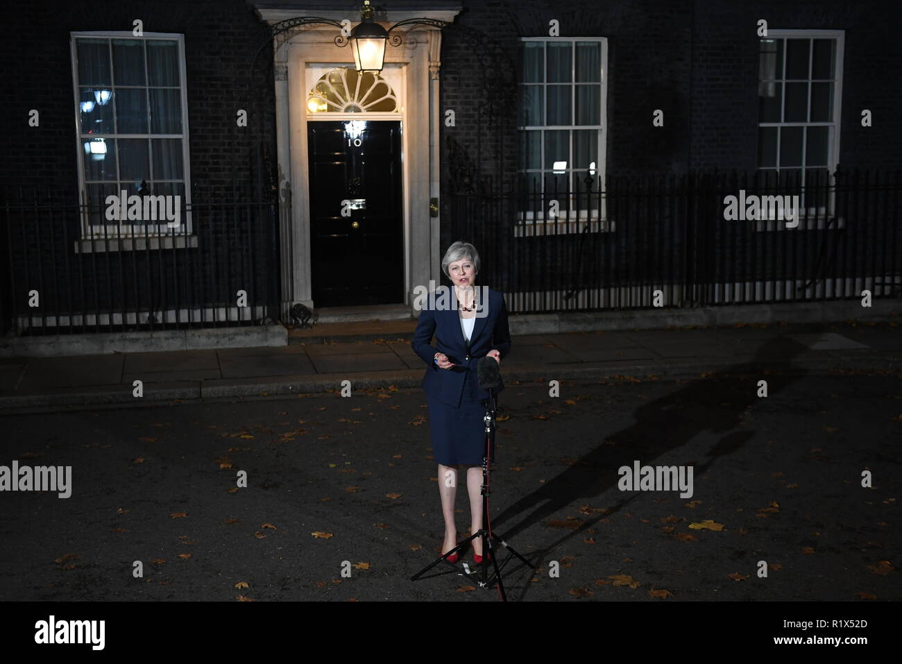 Prime Minister Theresa May makes a statement outside 10 Downing Street, London, confirming that Cabinet has agreed the draft Brexit withdrawal agreement. Stock Photo