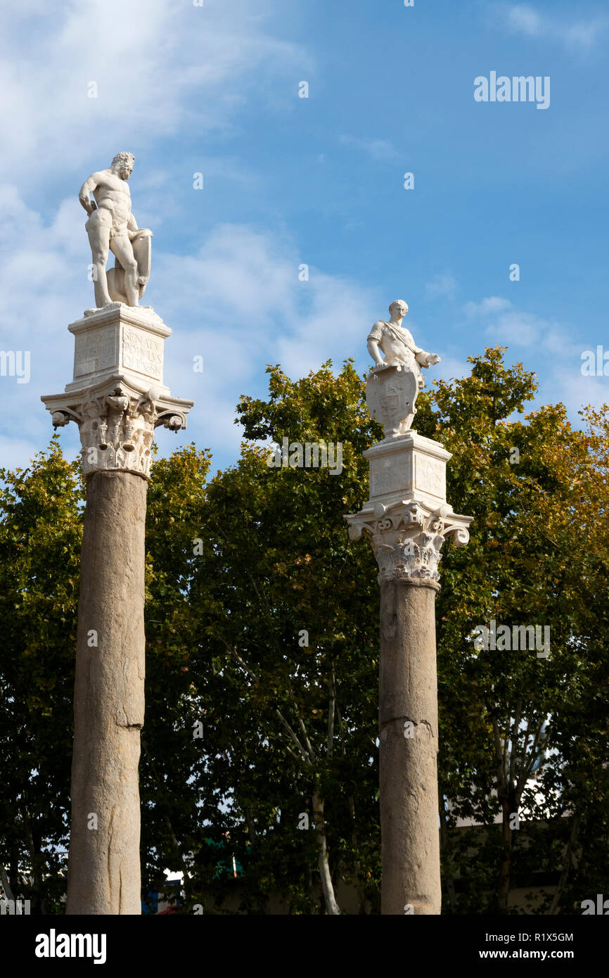 Statues at the south end of Alameda de Hercules in Seville, Spain