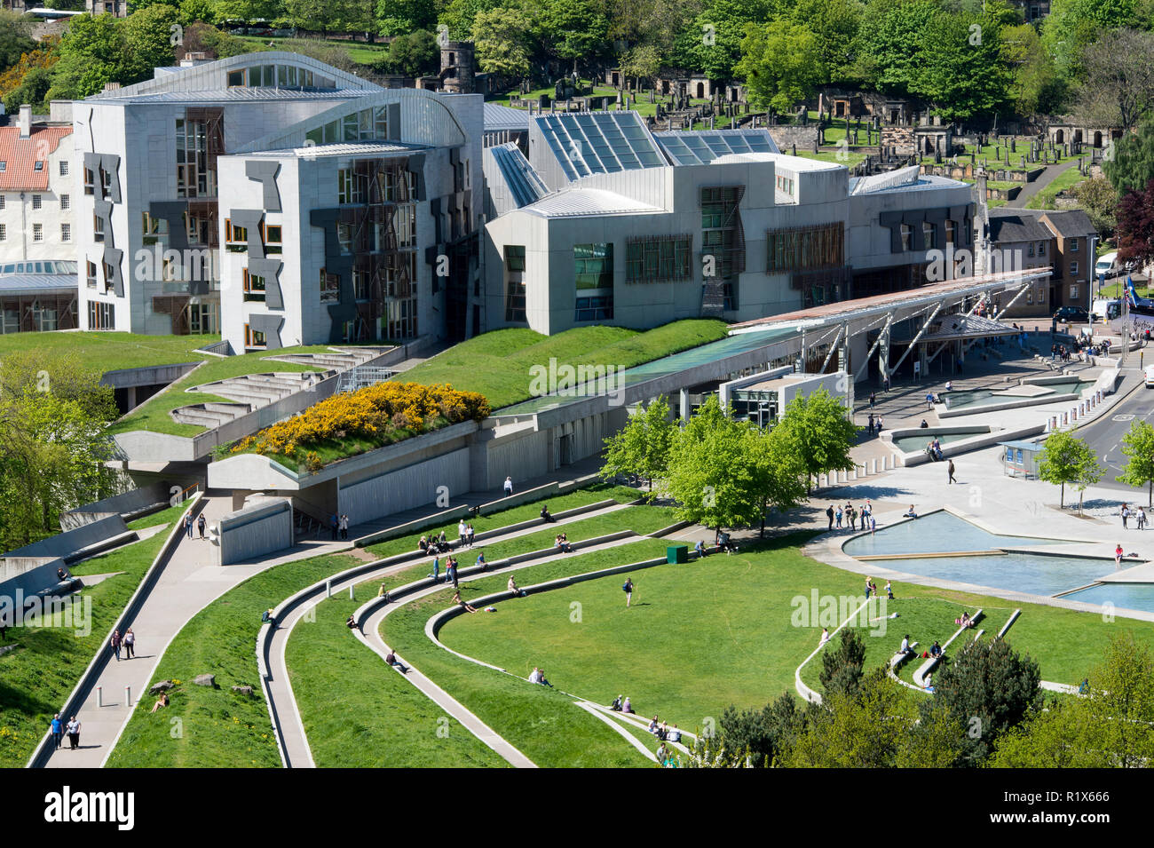 A view of the Scottish Parliament at Holyrood and Calton Hill behind, Edinburgh, Scotland. Stock Photo