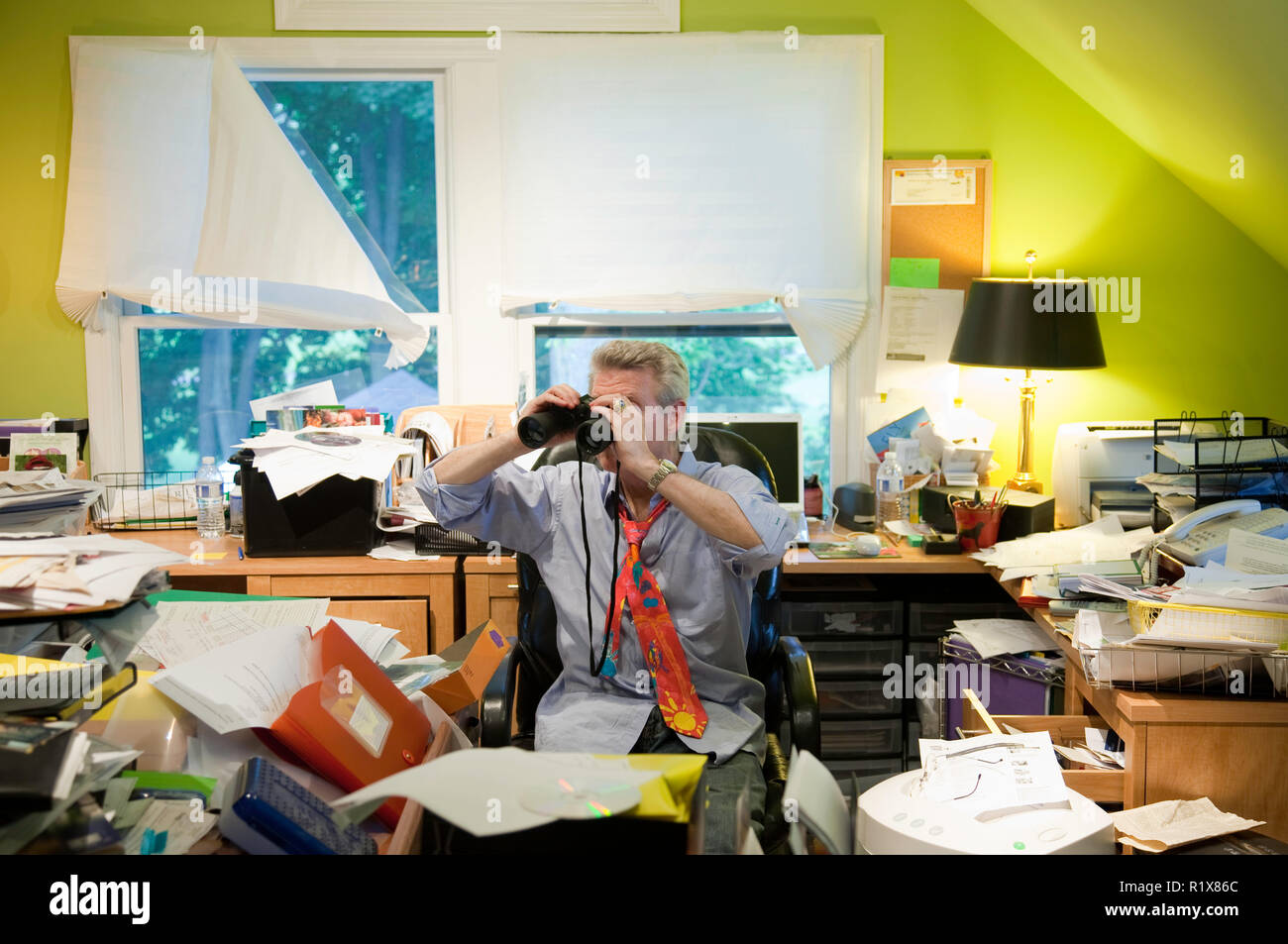Businessman in Hoarder's Messy Home Office, USA Stock Photo Alamy
