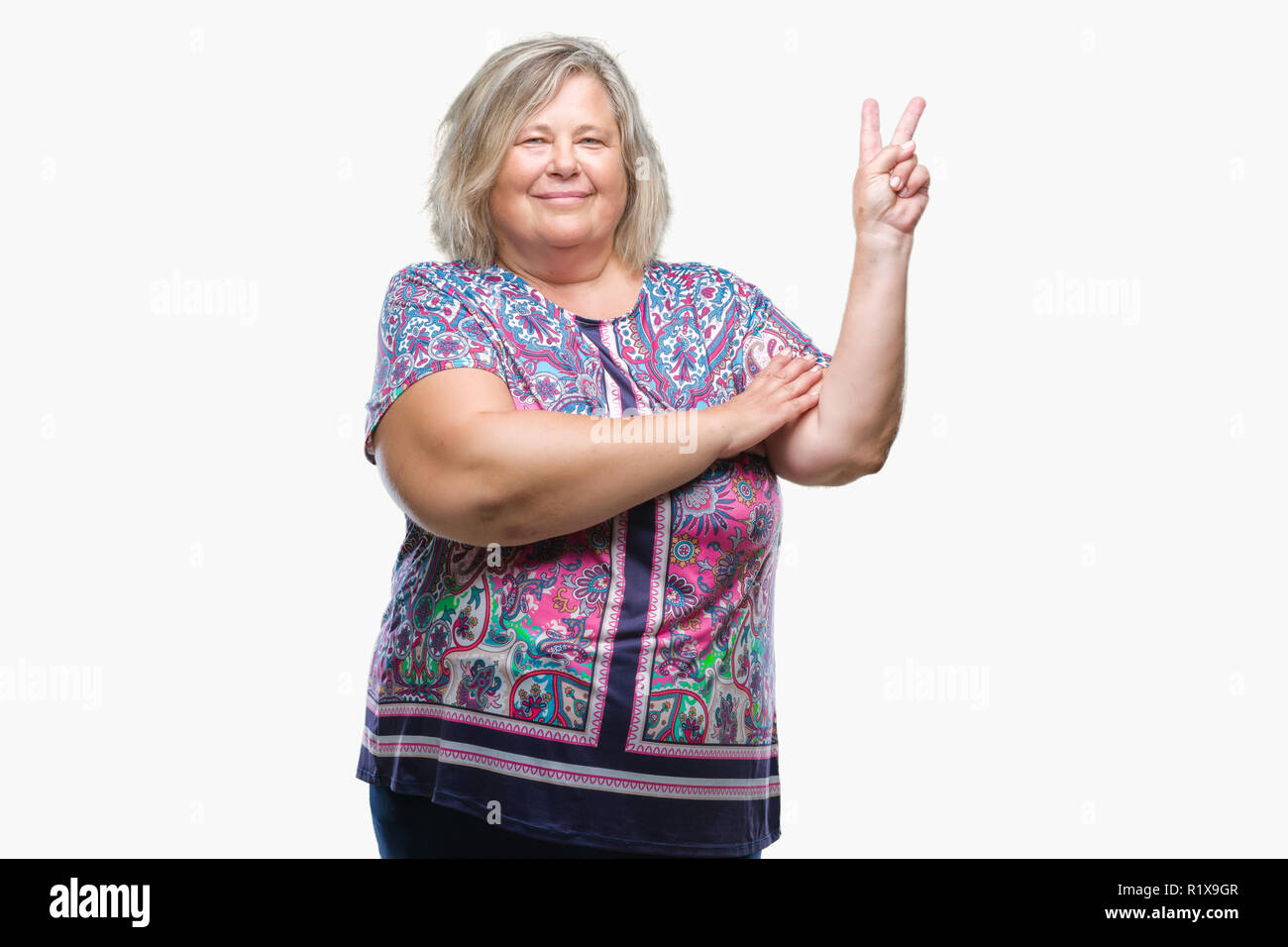 Senior plus size caucasian woman over isolated background smiling with ...