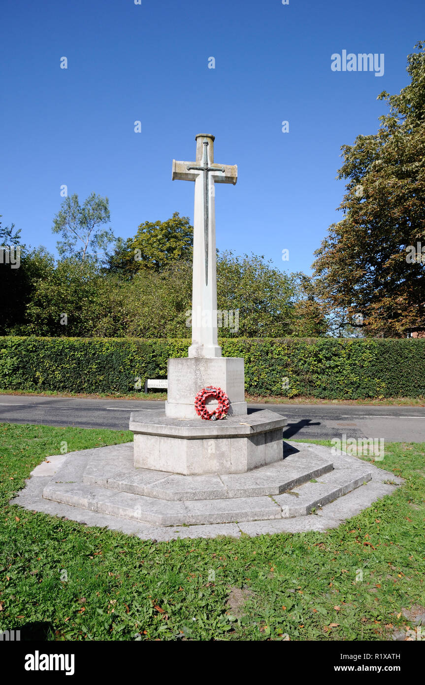 The War Memorial, Little Berkhamsted, Hertfordshire, stands on a small triangular green. Stock Photo