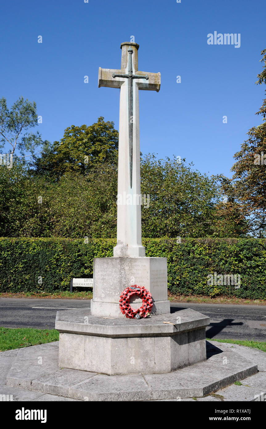 The War Memorial, Little Berkhamsted, Hertfordshire, stands on a small triangular green. Stock Photo