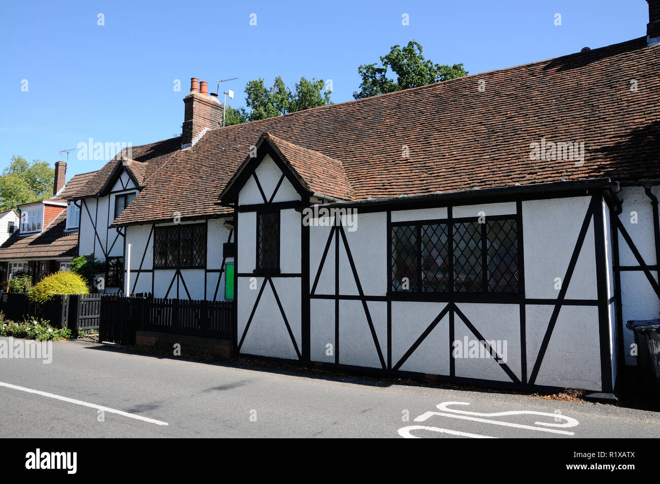 Village Hall., Little Berkhamsted, Hertfordshire, is a white building with timbers, and lattice
