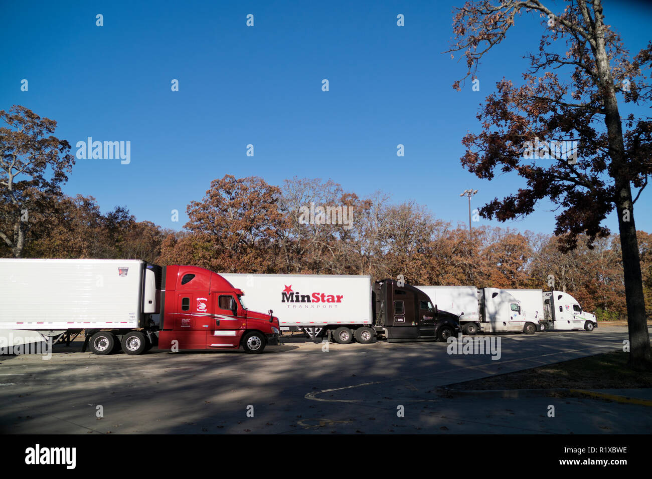 Eighteen wheelers parked at the Post Oak rest area near Salem, Illinois. Stock Photo