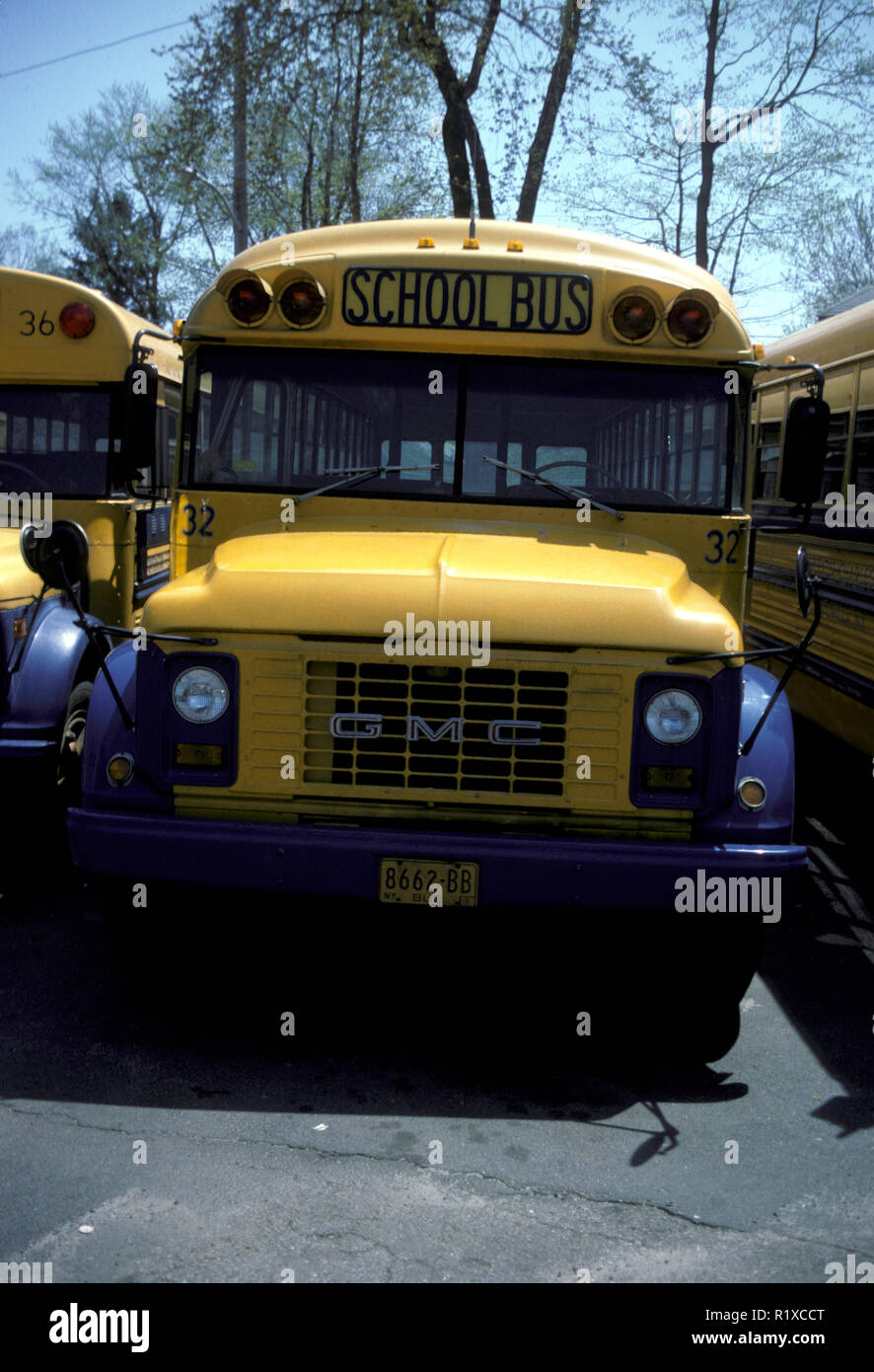 NOT 519006 A PARKED YELLOW AMERICAN GMC SCHOOL BUS Stock Photo