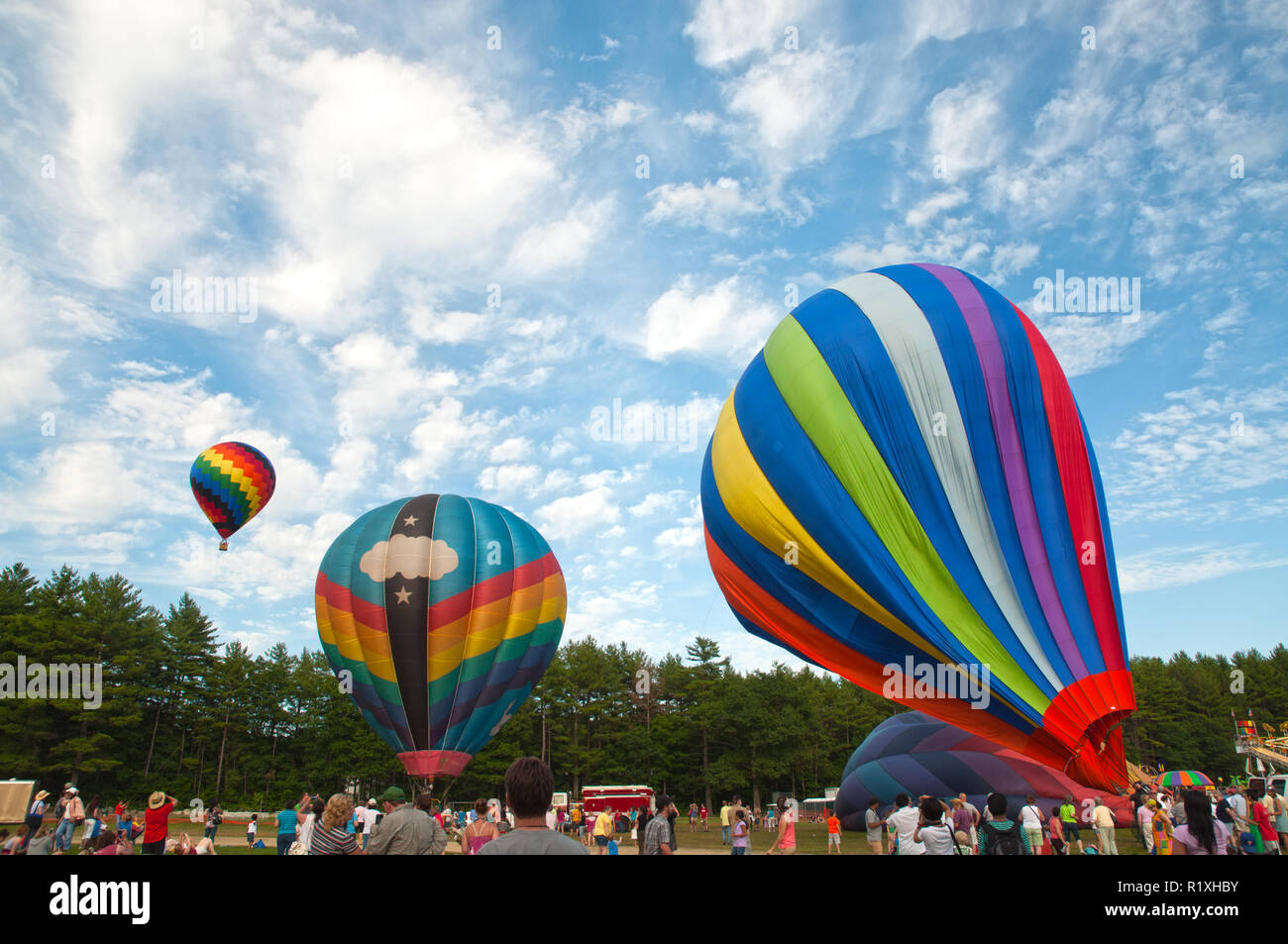 Many various colors and designs were the attraction of these hot air balloons. Stock Photo