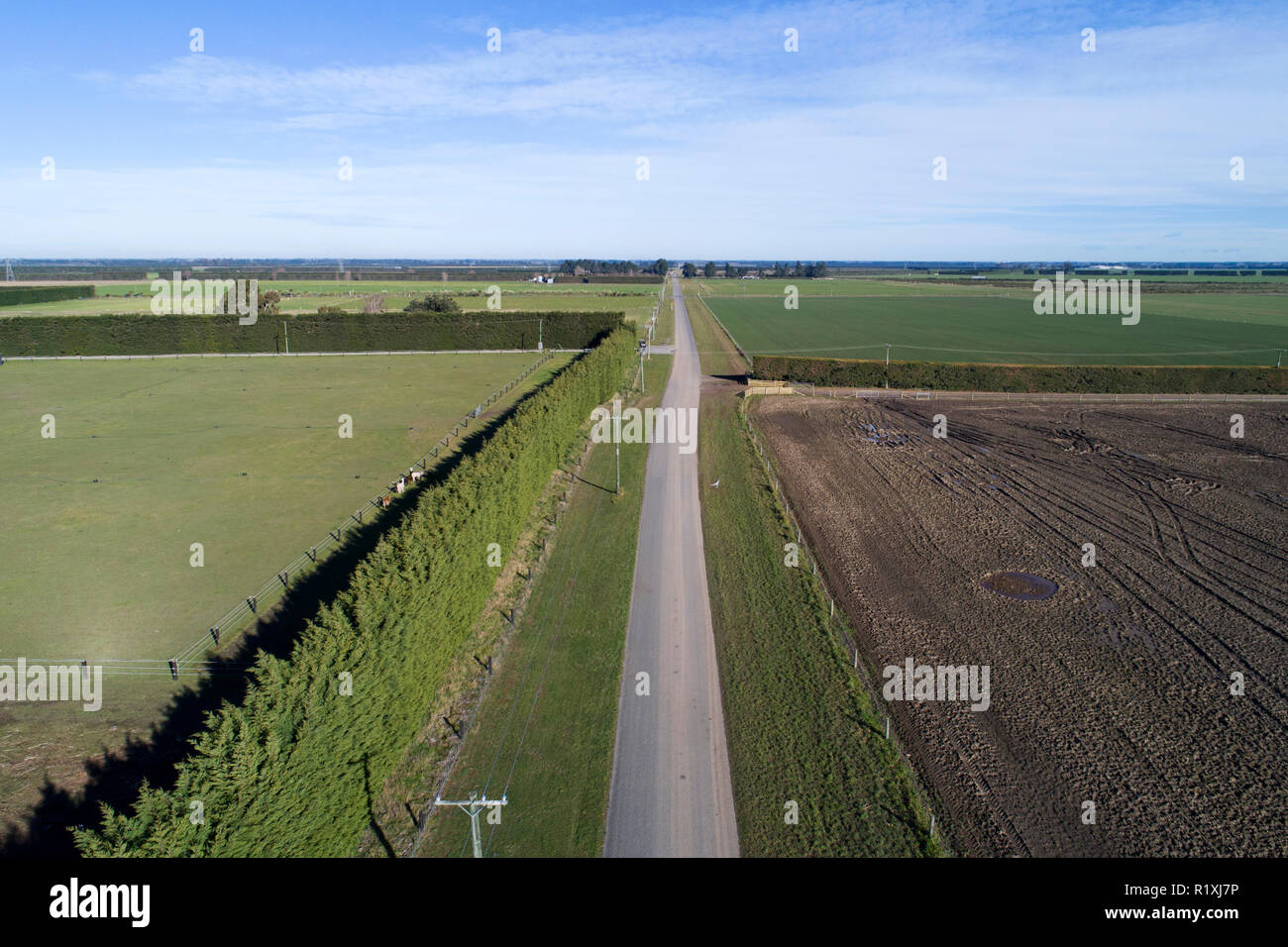 Road moved 4 metres sideways across fault line after earthquake, 4th September 2010, near Darfield, Canterbury, South Island, New Zealand - aerial Stock Photo