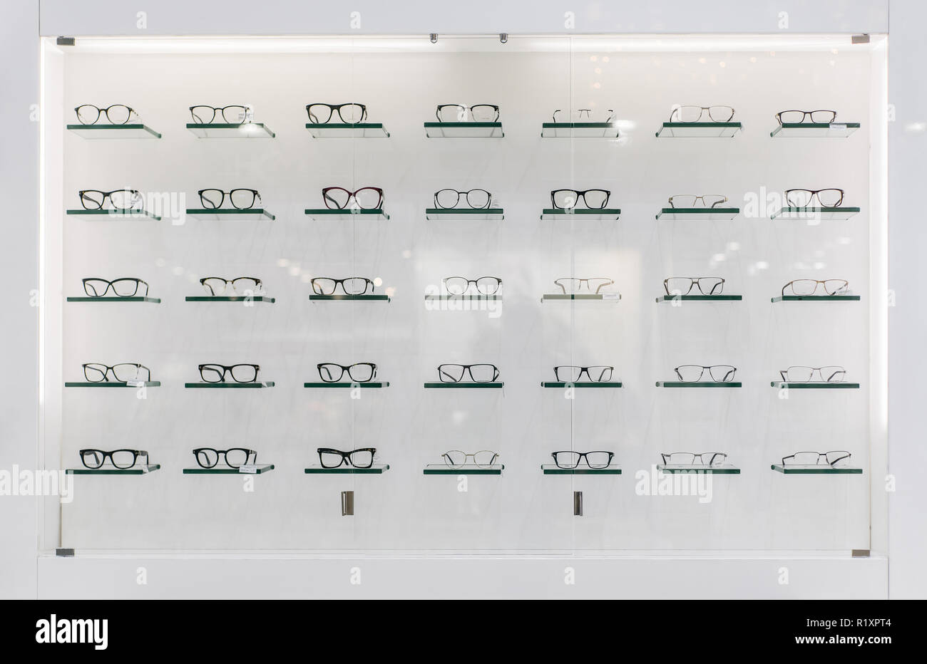 A lot of glasses at isolated shopping window Stock Photo