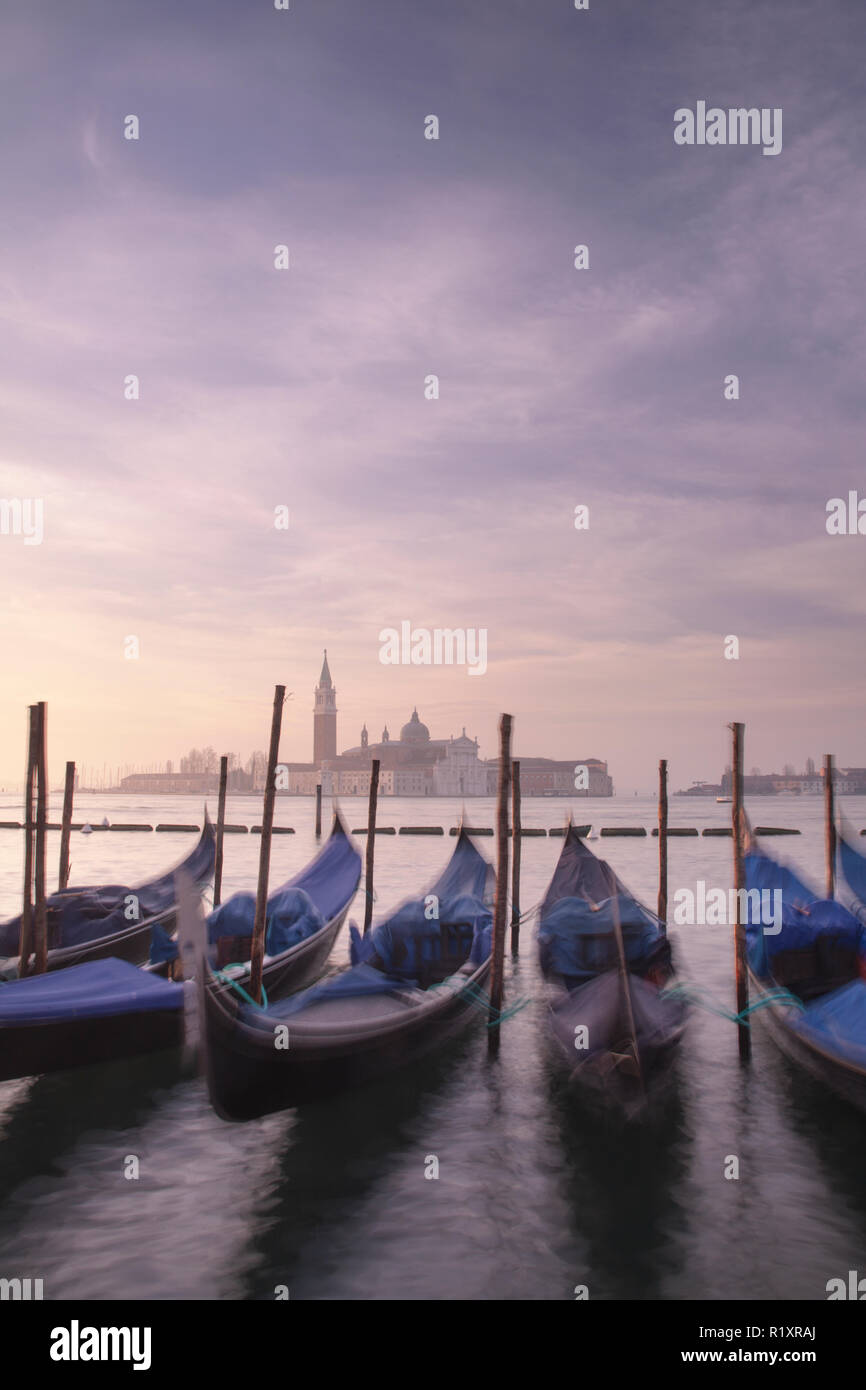 Gondolas moored at San Marco at dawn, Venice, Italy Stock Photo