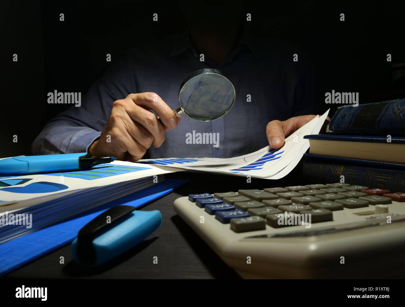 Auditor checks financial report with magnifying glass. Internal audit ...