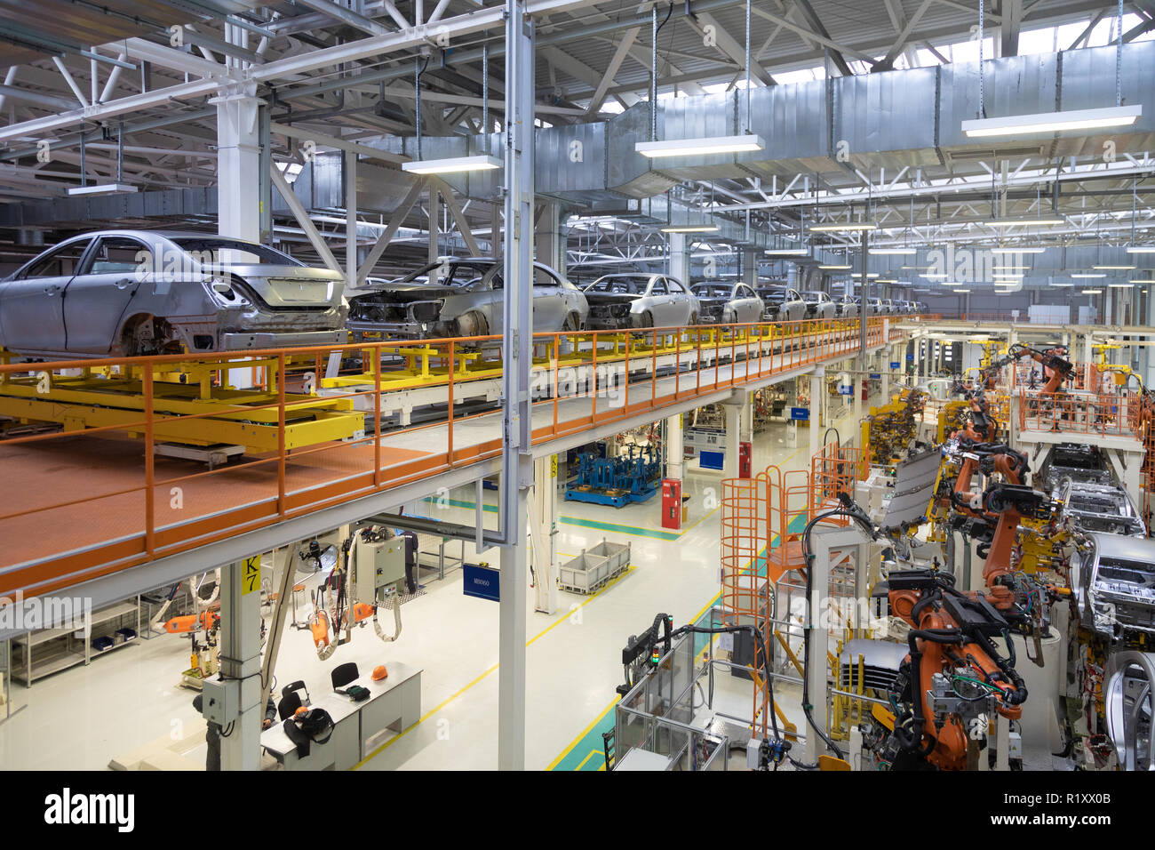 body of car on conveyor Modern Assembly of cars at plant. automated