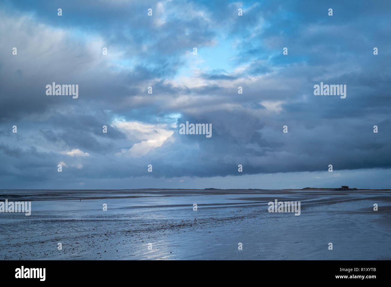 Cloudy skyscene and Norfolk coastal scene at Titchwell, North Norfolk, England, UK Stock Photo
