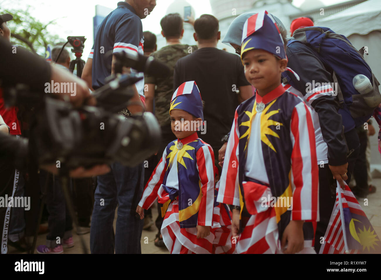 Children wearing custom made national flag join the Malaysia independance day celebration 2018. Stock Photo