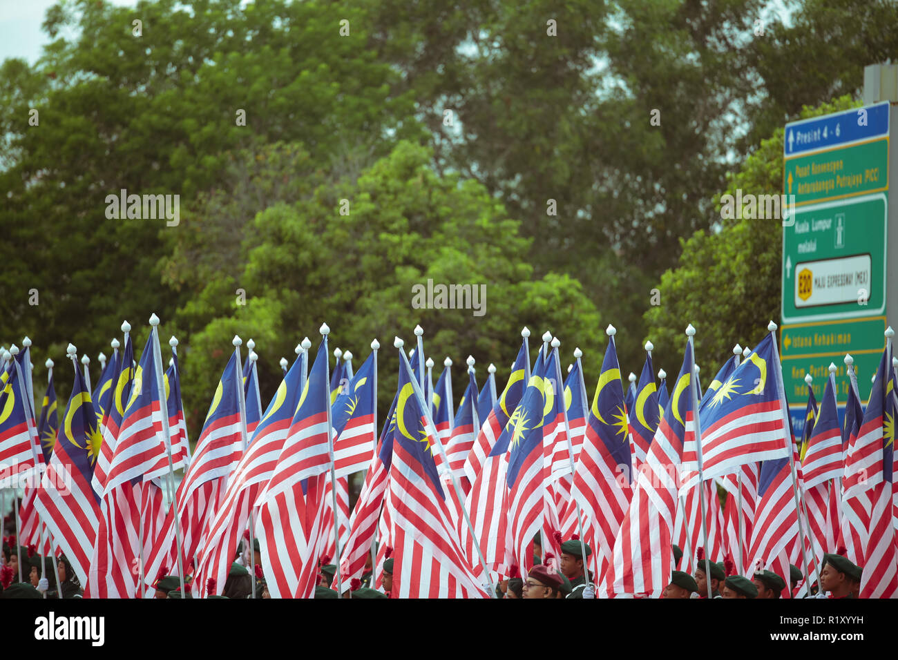 Military regime personnels holding high the national flag at Putrajaya during Malaysia independance day celebration 2018 Stock Photo
