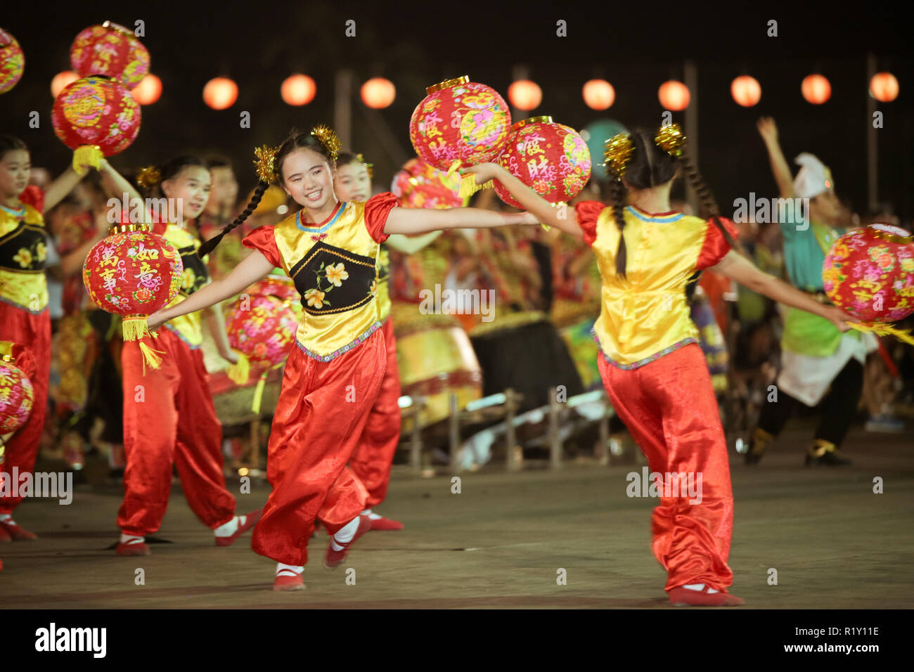 Chinese musical dancers performing in the Bon Odori festival to offer cultural variety to the festival. Stock Photo