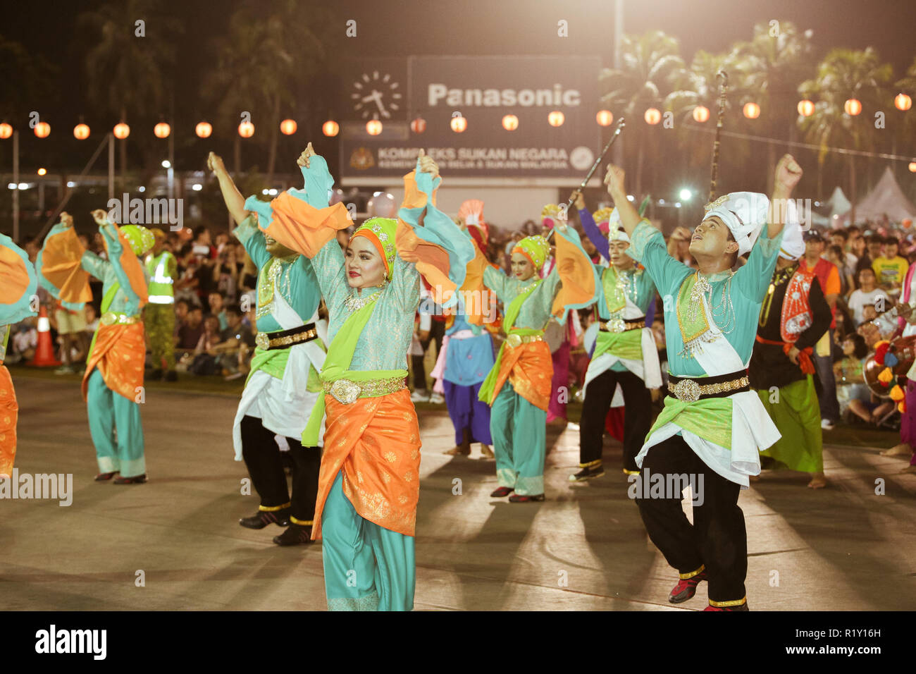 Malay musical dancers performing in the Bon Odori festival to offer cultural variety to the festival. Stock Photo