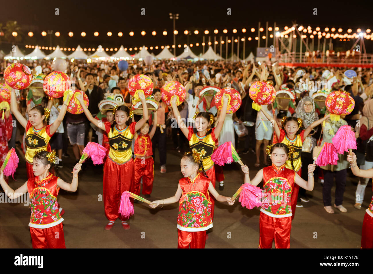 Chinese musical dancers performing in the Bon Odori festival to offer cultural variety to the festival. Stock Photo