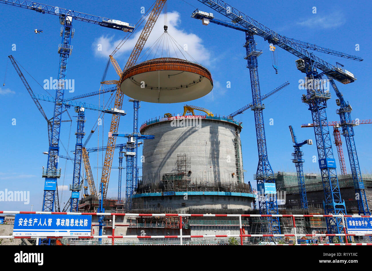 (181115) -- BEIJING, Nov. 15, 2018 (Xinhua) -- Photo taken on May 23, 2018 shows the installation site of a hemispherical dome at the No. 3 unit of Fangchenggang nuclear power station in south China's Guangxi Zhuang Autonomous Region. According to the National Bureau of Statistics, China's power generation rose 7.2 percent year-on-year in the first 10 months of 2018. In October alone, China generated 533 billion kilowatt-hours (kWh) of power, up 4.8 percent year on year, faster than the 4.6-percent growth in September. The average daily power generation reached 17.2 billion kWh, edging down fr Stock Photo